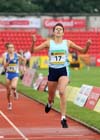 Chelsea Nugent (Cumbria) wins the Junior Girls 800 metres.